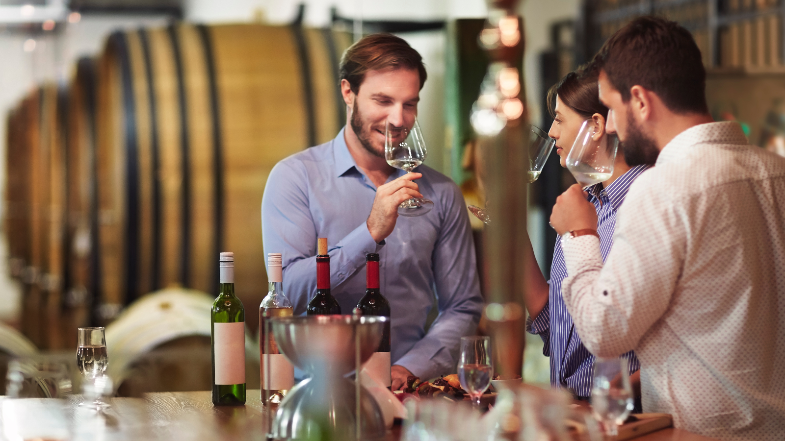 Image of a wine Connoisseur tasting wine